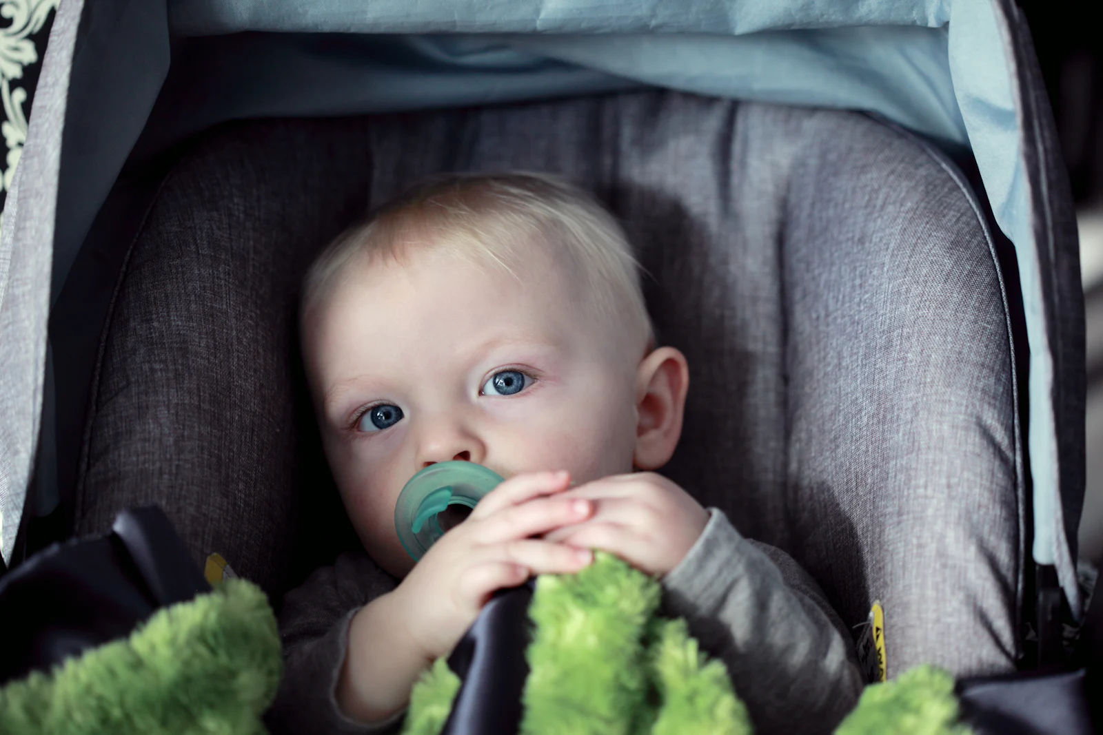Baby sitting safely in a child car seat