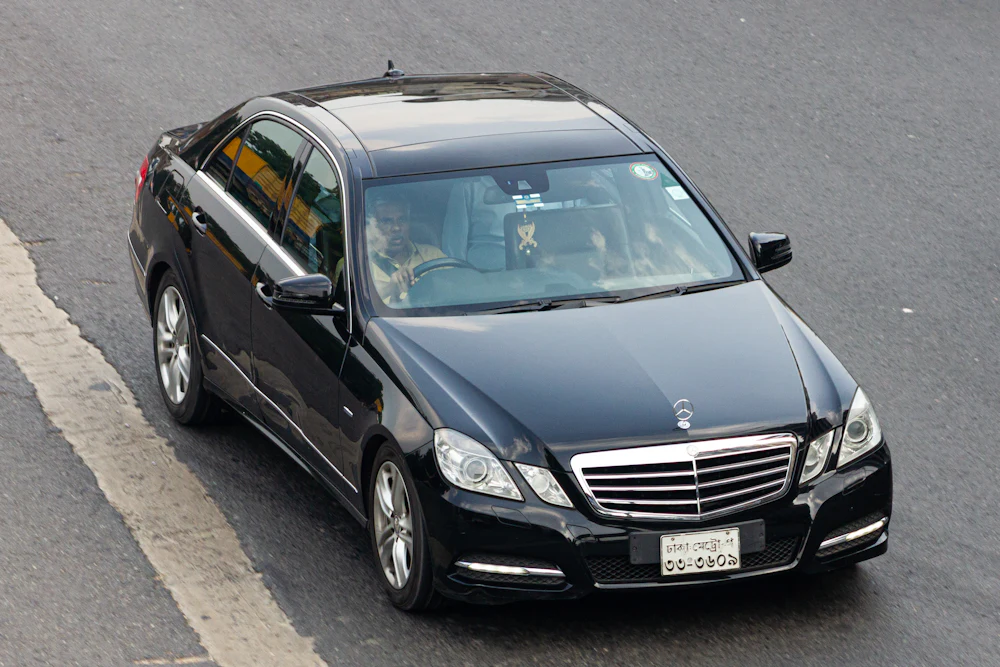 Black Mercedes E-Class sedan